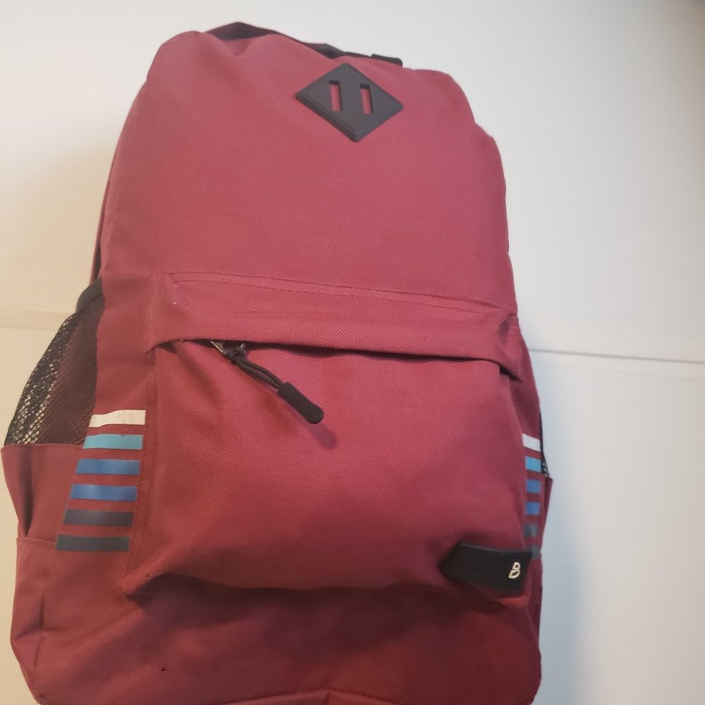 Bond Street Backpack red side stripes design white blue black pockets front hand - Picture 9 of 13